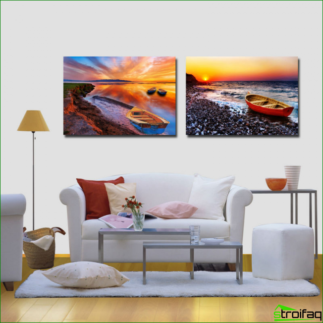 Colorful paintings on one motif in different designs in a bright living room